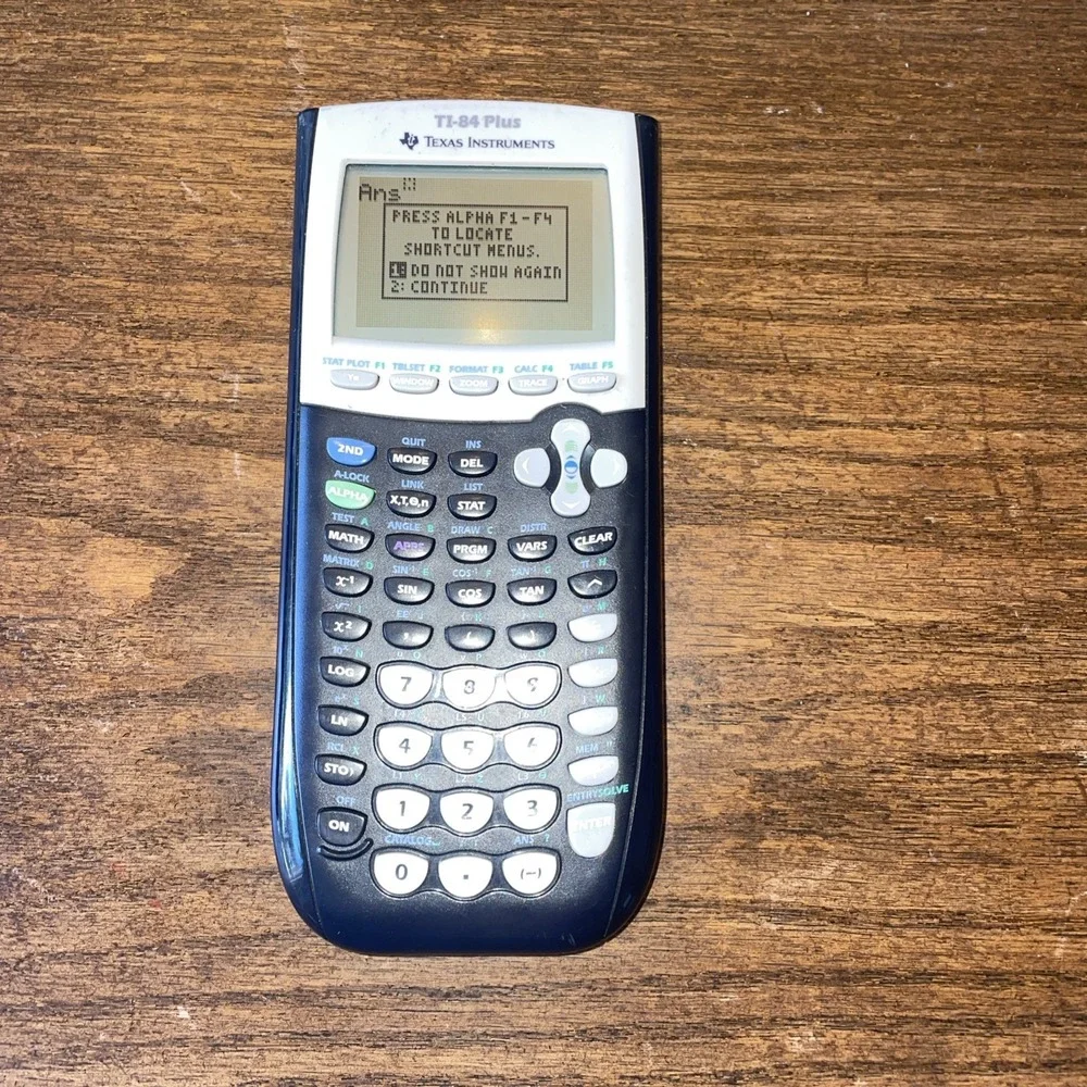 Texas Instruments TI-84 Plus Graphing Calculator with Slip Cover Tested